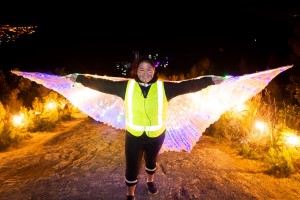 Girl with light-up wings at the top of the Te Whiti night riser walk